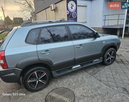 Зеленый Хендай Туксон, объемом двигателя 1.98 л и пробегом 158 тыс. км за 8300 $, фото 1 на Automoto.ua