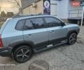 Зеленый Хендай Туксон, объемом двигателя 1.98 л и пробегом 158 тыс. км за 8300 $, фото 1 на Automoto.ua