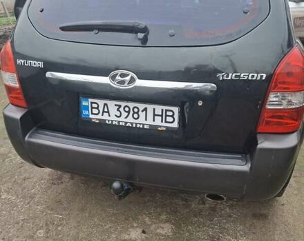 Зеленый Хендай Туксон, объемом двигателя 2 л и пробегом 228 тыс. км за 6500 $, фото 6 на Automoto.ua