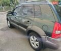 Зеленый Хендай Туксон, объемом двигателя 2 л и пробегом 140 тыс. км за 8800 $, фото 4 на Automoto.ua