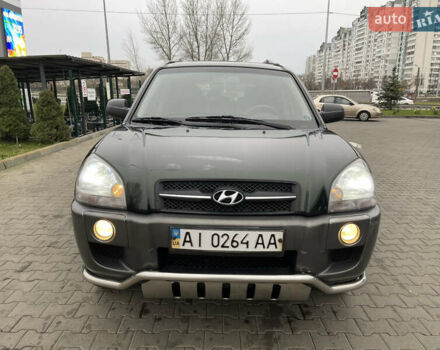Зеленый Хендай Туксон, объемом двигателя 1.98 л и пробегом 295 тыс. км за 5950 $, фото 11 на Automoto.ua