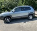 Зеленый Хендай Туксон, объемом двигателя 2 л и пробегом 130 тыс. км за 9100 $, фото 1 на Automoto.ua