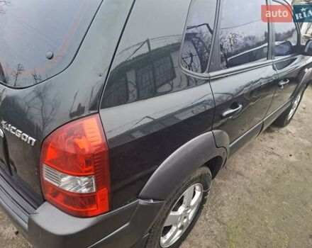 Зеленый Хендай Туксон, объемом двигателя 2 л и пробегом 228 тыс. км за 6500 $, фото 7 на Automoto.ua