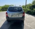 Зеленый Хендай Туксон, объемом двигателя 2 л и пробегом 130 тыс. км за 9100 $, фото 4 на Automoto.ua