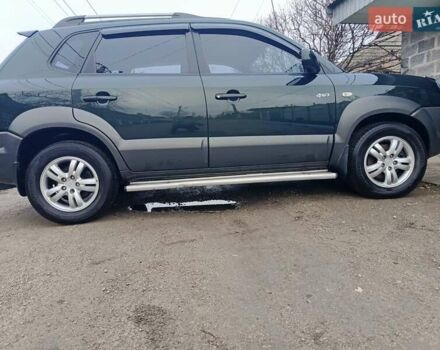 Зеленый Хендай Туксон, объемом двигателя 2 л и пробегом 108 тыс. км за 8700 $, фото 37 на Automoto.ua