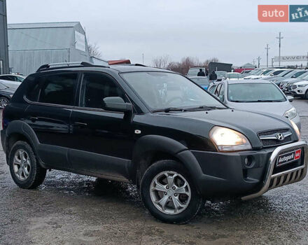 Зеленый Хендай Туксон, объемом двигателя 2 л и пробегом 223 тыс. км за 7290 $, фото 2 на Automoto.ua