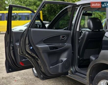 Зелений Хендай Туксон, об'ємом двигуна 1.98 л та пробігом 260 тис. км за 7199 $, фото 14 на Automoto.ua