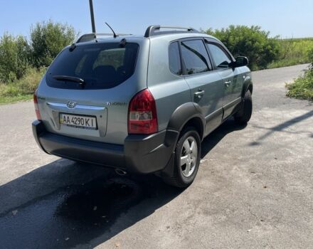 Зеленый Хендай Туксон, объемом двигателя 2 л и пробегом 130 тыс. км за 9100 $, фото 5 на Automoto.ua