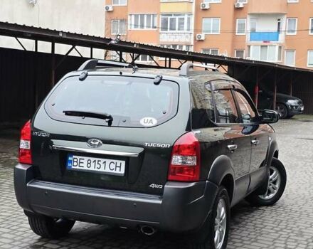 Зеленый Хендай Туксон, объемом двигателя 1.98 л и пробегом 178 тыс. км за 8900 $, фото 11 на Automoto.ua