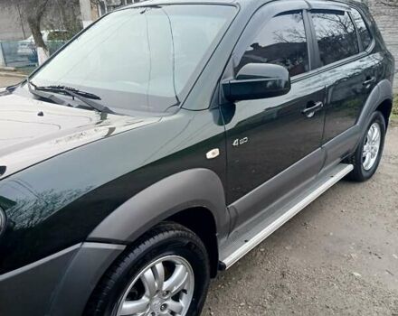 Зеленый Хендай Туксон, объемом двигателя 2 л и пробегом 108 тыс. км за 8700 $, фото 39 на Automoto.ua