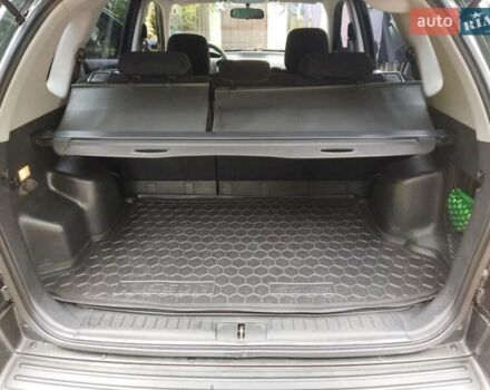 Зелений Хендай Туксон, об'ємом двигуна 2 л та пробігом 94 тис. км за 9000 $, фото 7 на Automoto.ua