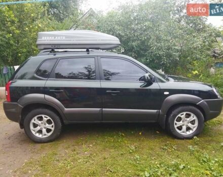 Зелений Хендай Туксон, об'ємом двигуна 2 л та пробігом 94 тис. км за 9000 $, фото 4 на Automoto.ua