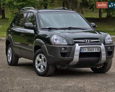 Зелений Хендай Туксон, об'ємом двигуна 1.98 л та пробігом 260 тис. км за 7199 $, фото 7 на Automoto.ua
