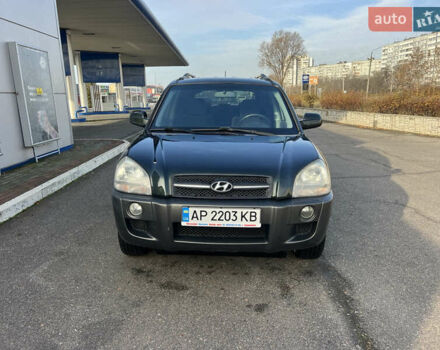 Зеленый Хендай Туксон, объемом двигателя 1.98 л и пробегом 130 тыс. км за 9100 $, фото 7 на Automoto.ua