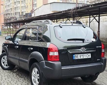 Зеленый Хендай Туксон, объемом двигателя 1.98 л и пробегом 178 тыс. км за 8900 $, фото 6 на Automoto.ua