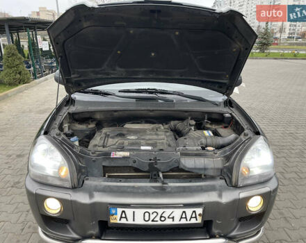 Зеленый Хендай Туксон, объемом двигателя 1.98 л и пробегом 295 тыс. км за 5950 $, фото 33 на Automoto.ua