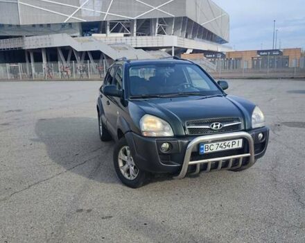 Зеленый Хендай Туксон, объемом двигателя 1.98 л и пробегом 220 тыс. км за 6800 $, фото 7 на Automoto.ua