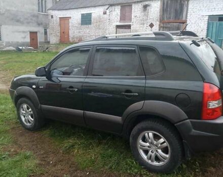 Зелений Хендай Туксон, об'ємом двигуна 1.99 л та пробігом 281 тис. км за 8500 $, фото 10 на Automoto.ua