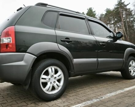 Зеленый Хендай Туксон, объемом двигателя 2 л и пробегом 275 тыс. км за 7999 $, фото 1 на Automoto.ua