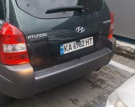Зеленый Хендай Туксон, объемом двигателя 1.98 л и пробегом 270 тыс. км за 8100 $, фото 5 на Automoto.ua