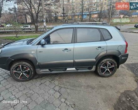 Зеленый Хендай Туксон, объемом двигателя 1.98 л и пробегом 158 тыс. км за 8300 $, фото 3 на Automoto.ua