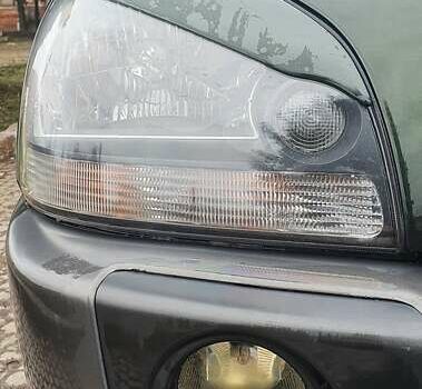 Зеленый Хендай Туксон, объемом двигателя 2 л и пробегом 115 тыс. км за 8500 $, фото 21 на Automoto.ua