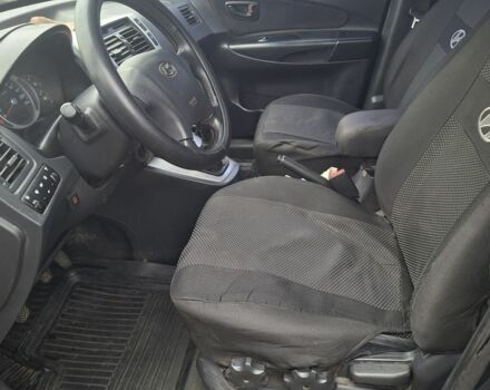 Зеленый Хендай Туксон, объемом двигателя 2 л и пробегом 228 тыс. км за 6500 $, фото 11 на Automoto.ua