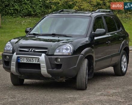 Зелений Хендай Туксон, об'ємом двигуна 1.98 л та пробігом 260 тис. км за 7199 $, фото 6 на Automoto.ua