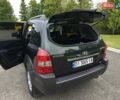 Зелений Хендай Туксон, об'ємом двигуна 1.98 л та пробігом 260 тис. км за 7199 $, фото 29 на Automoto.ua