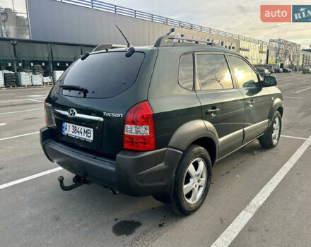 Зелений Хендай Туксон, об'ємом двигуна 1.98 л та пробігом 156 тис. км за 7999 $, фото 4 на Automoto.ua