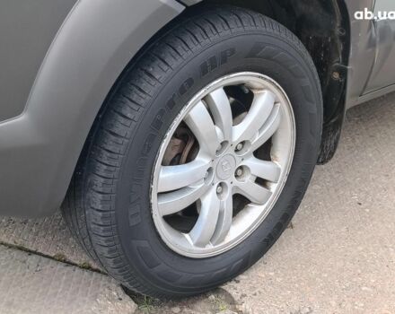 Зеленый Хендай Туксон, объемом двигателя 2 л и пробегом 314 тыс. км за 7790 $, фото 3 на Automoto.ua