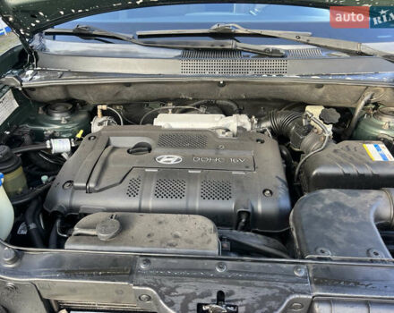 Зеленый Хендай Туксон, объемом двигателя 1.98 л и пробегом 130 тыс. км за 9100 $, фото 8 на Automoto.ua