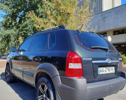 Зеленый Хендай Туксон, объемом двигателя 1.98 л и пробегом 200 тыс. км за 7000 $, фото 4 на Automoto.ua