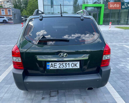 Зеленый Хендай Туксон, объемом двигателя 1.98 л и пробегом 180 тыс. км за 9200 $, фото 6 на Automoto.ua