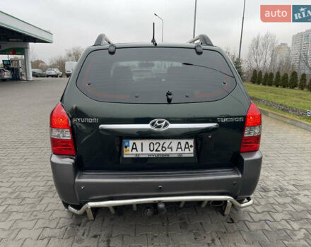 Зеленый Хендай Туксон, объемом двигателя 1.98 л и пробегом 295 тыс. км за 5950 $, фото 5 на Automoto.ua