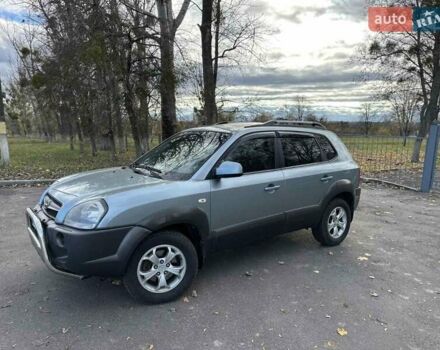 Зеленый Хендай Туксон, объемом двигателя 1.98 л и пробегом 168 тыс. км за 8800 $, фото 14 на Automoto.ua