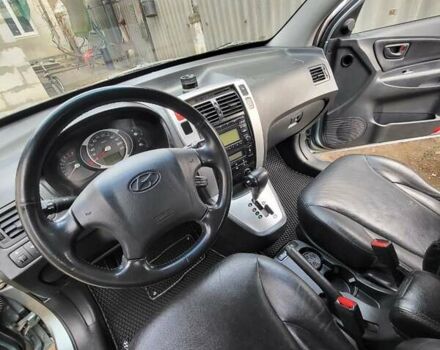 Зеленый Хендай Туксон, объемом двигателя 2.66 л и пробегом 166 тыс. км за 8500 $, фото 3 на Automoto.ua