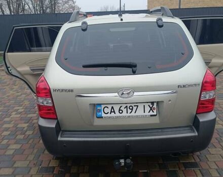 Зелений Хендай Туксон, об'ємом двигуна 1.98 л та пробігом 132 тис. км за 8300 $, фото 10 на Automoto.ua