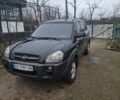 Зеленый Хендай Туксон, объемом двигателя 2 л и пробегом 228 тыс. км за 6500 $, фото 1 на Automoto.ua
