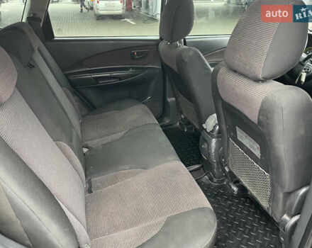 Зеленый Хендай Туксон, объемом двигателя 1.98 л и пробегом 295 тыс. км за 5950 $, фото 21 на Automoto.ua