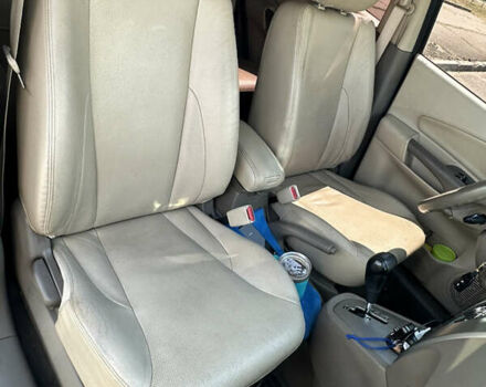 Зелений Хендай Туксон, об'ємом двигуна 2.7 л та пробігом 187 тис. км за 8499 $, фото 4 на Automoto.ua