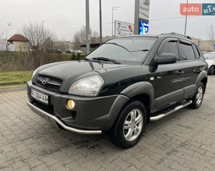Зеленый Хендай Туксон, объемом двигателя 1.98 л и пробегом 295 тыс. км за 5950 $, фото 12 на Automoto.ua