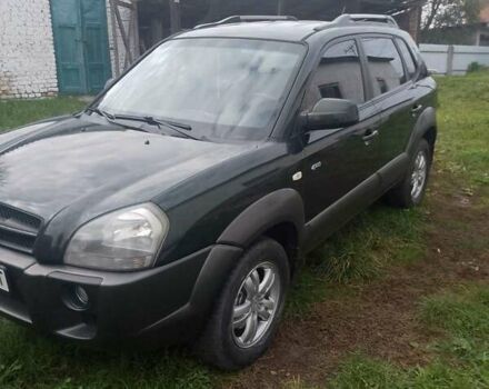 Зелений Хендай Туксон, об'ємом двигуна 1.99 л та пробігом 281 тис. км за 8500 $, фото 4 на Automoto.ua