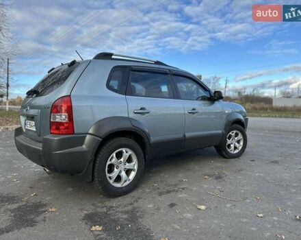 Зеленый Хендай Туксон, объемом двигателя 1.98 л и пробегом 168 тыс. км за 8800 $, фото 20 на Automoto.ua