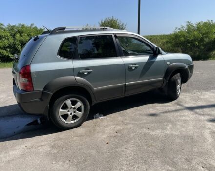 Зеленый Хендай Туксон, объемом двигателя 2 л и пробегом 130 тыс. км за 9100 $, фото 6 на Automoto.ua