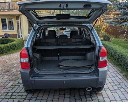 Зеленый Хендай Туксон, объемом двигателя 1.98 л и пробегом 200 тыс. км за 8000 $, фото 9 на Automoto.ua