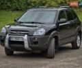 Зеленый Хендай Туксон, объемом двигателя 1.98 л и пробегом 256 тыс. км за 7500 $, фото 2 на Automoto.ua