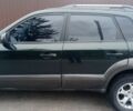 Зеленый Хендай Туксон, объемом двигателя 2 л и пробегом 190 тыс. км за 7500 $, фото 1 на Automoto.ua