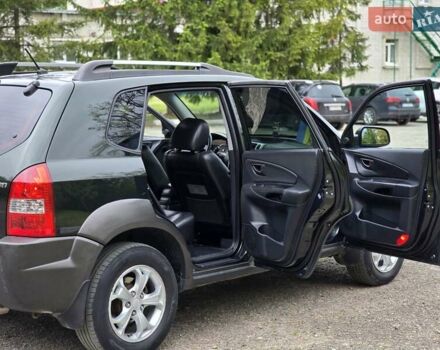 Зелений Хендай Туксон, об'ємом двигуна 1.98 л та пробігом 260 тис. км за 7199 $, фото 13 на Automoto.ua