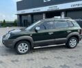Зеленый Хендай Туксон, объемом двигателя 2 л и пробегом 229 тыс. км за 7400 $, фото 2 на Automoto.ua